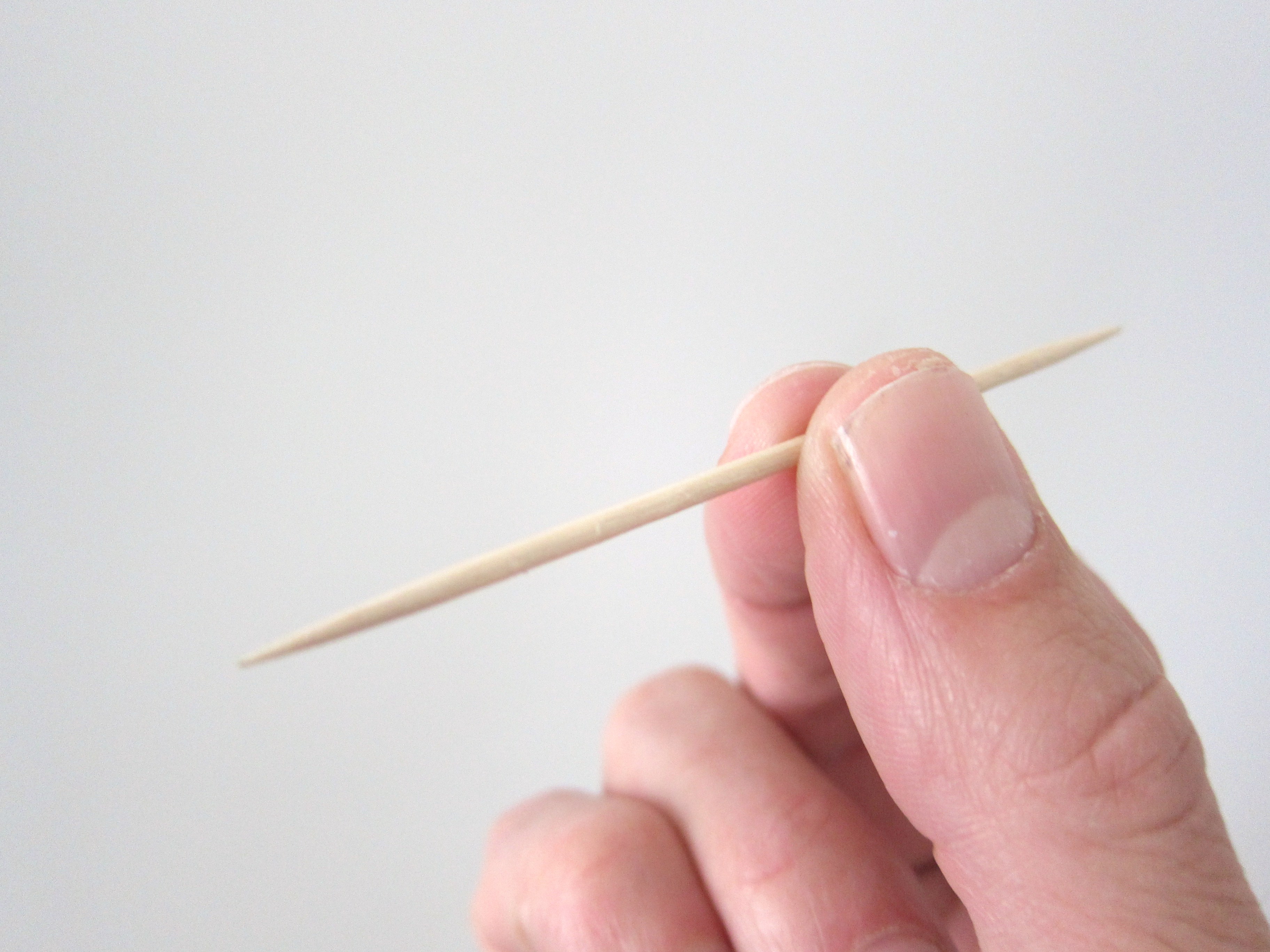 toothpick-held-in-hand.jpg